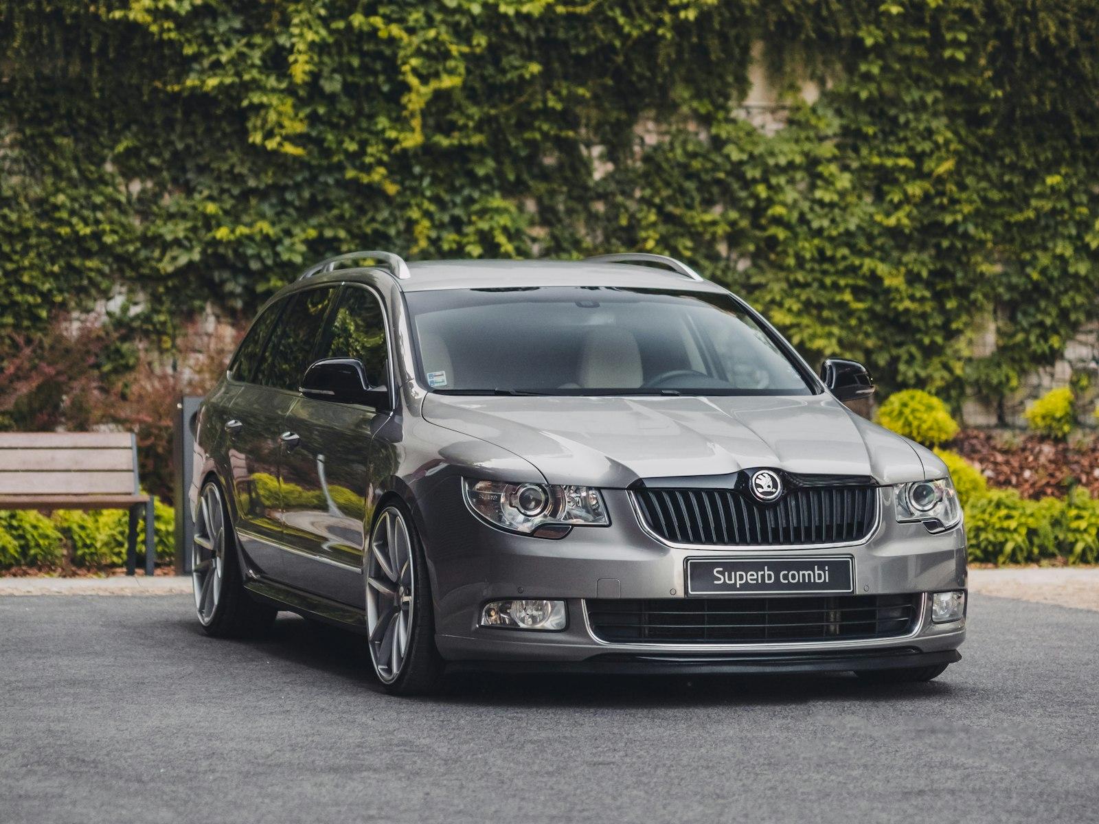 Dark grey Skoda Octavia Combi front quarter, chrome grille and winged badge