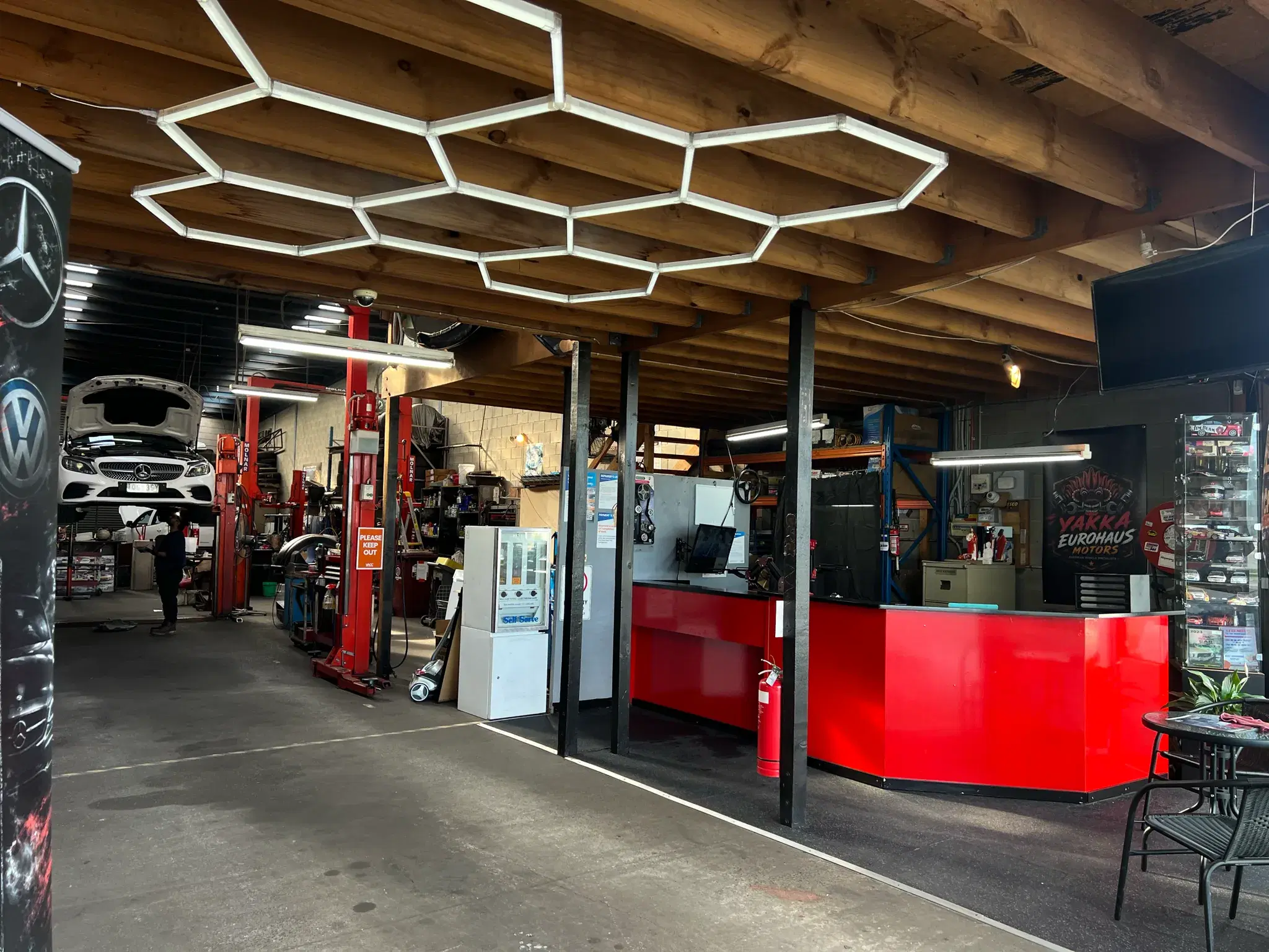 Yakka Eurohaus Motors workshop interior with the service counter and vehicle hoists